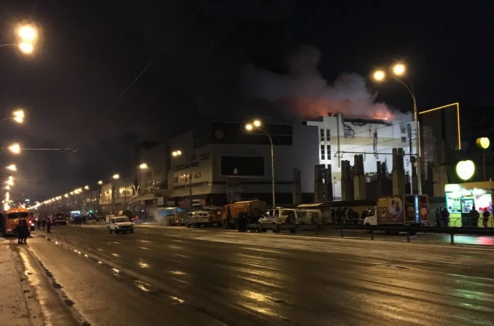 The Winter Cherry shopping centre in Kemerovo alight at 21:43 on 25 March 2018; the fire killed 60 people, most of them children. Photo: Wikimedia Commons user Eagle42. Licence: CC BY-SA 4.0 (derivative works must be shared under the same licence). Source: Wikimedia Commons